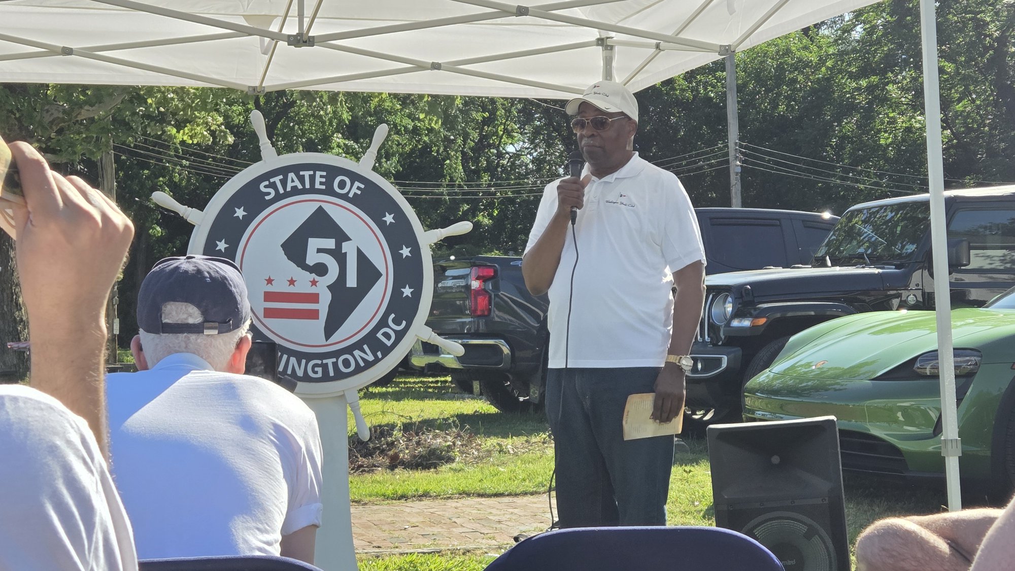 Flag Raising: Past Commodore of Washington Yacht Club Steve Ricks gives remarks