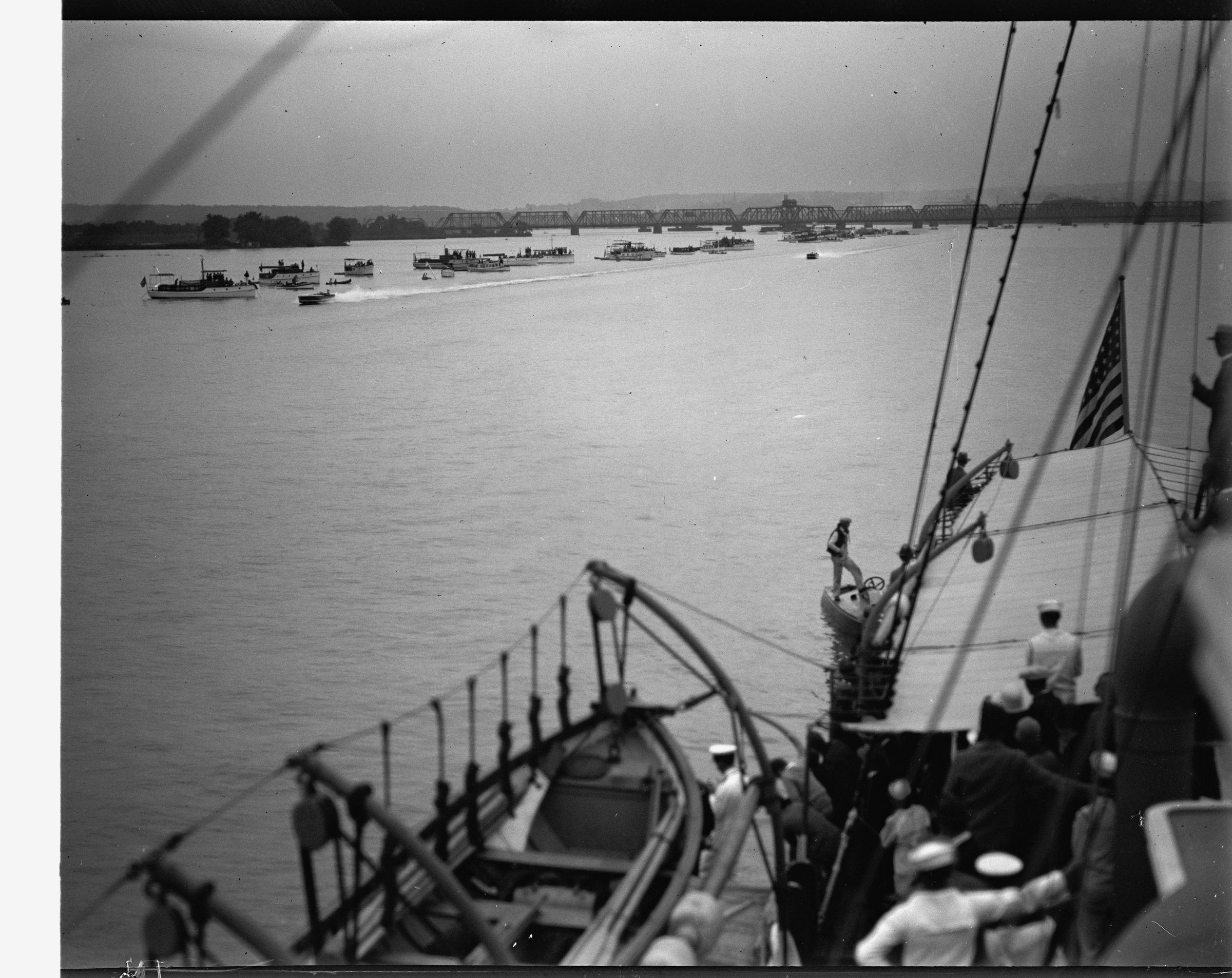 Powerboats on the Potomac for a regatta, seen from the deck of another boat, early twentieth century.