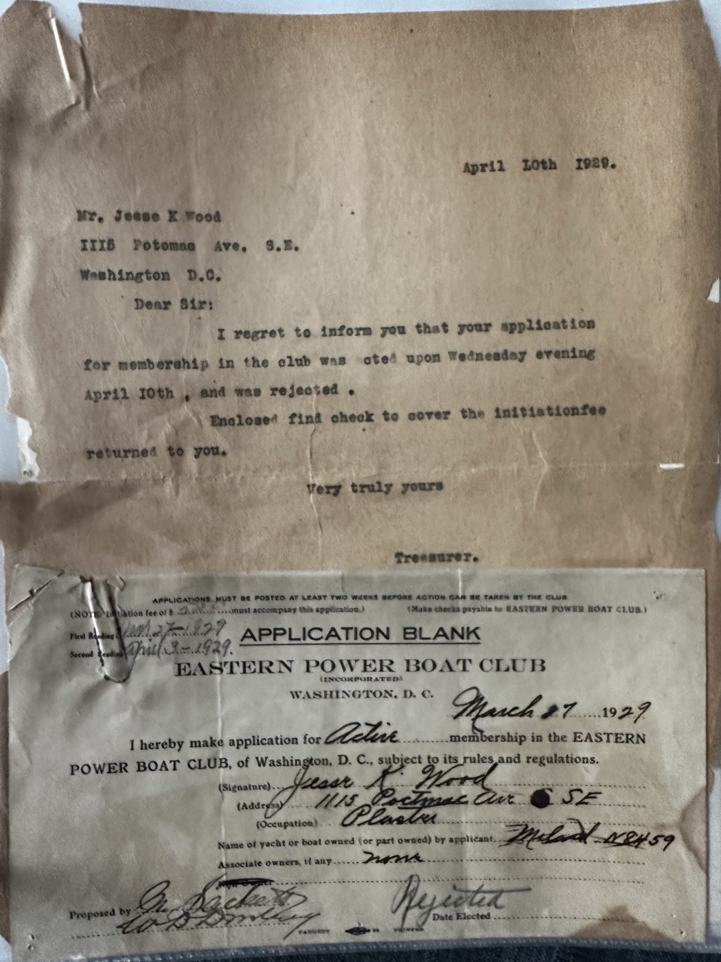 A 1929 Eastern Power Boat Club application blank filled out by a plasterer, clipped to a typed letter from the treasurer reporting that the application was rejected and the initiation fee returned.