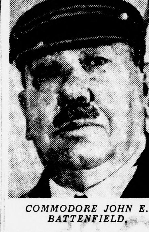 Newspaper portrait of Commodore John E. Battenfield, a heavy-set older man in a suit and tie.
