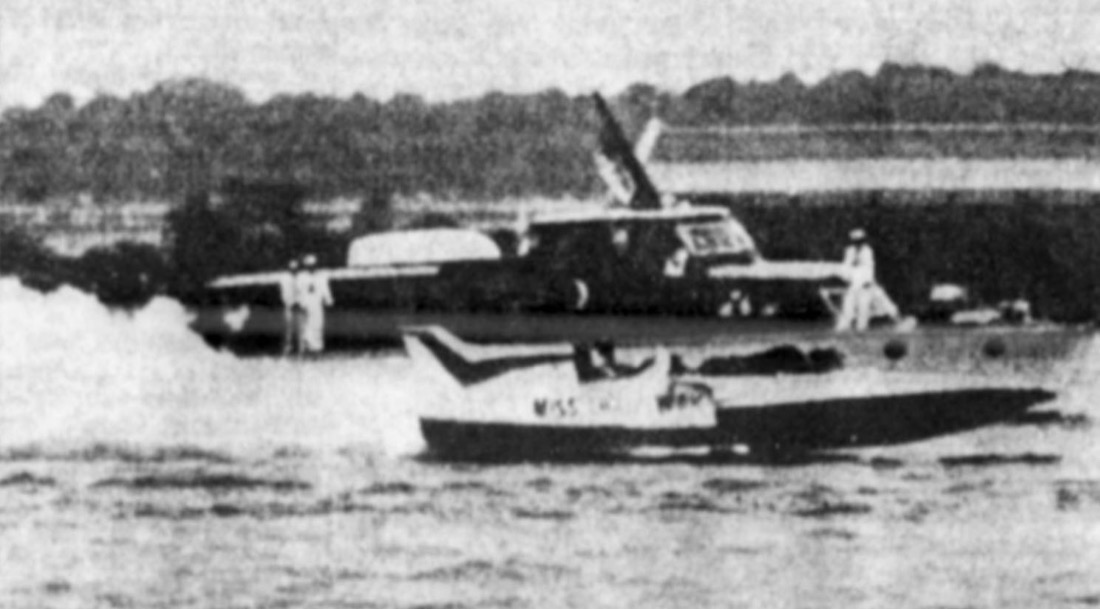The unlimited hydroplane Miss Thriftway on the Potomac at the 1960 President’s Cup, attended by officials in white.