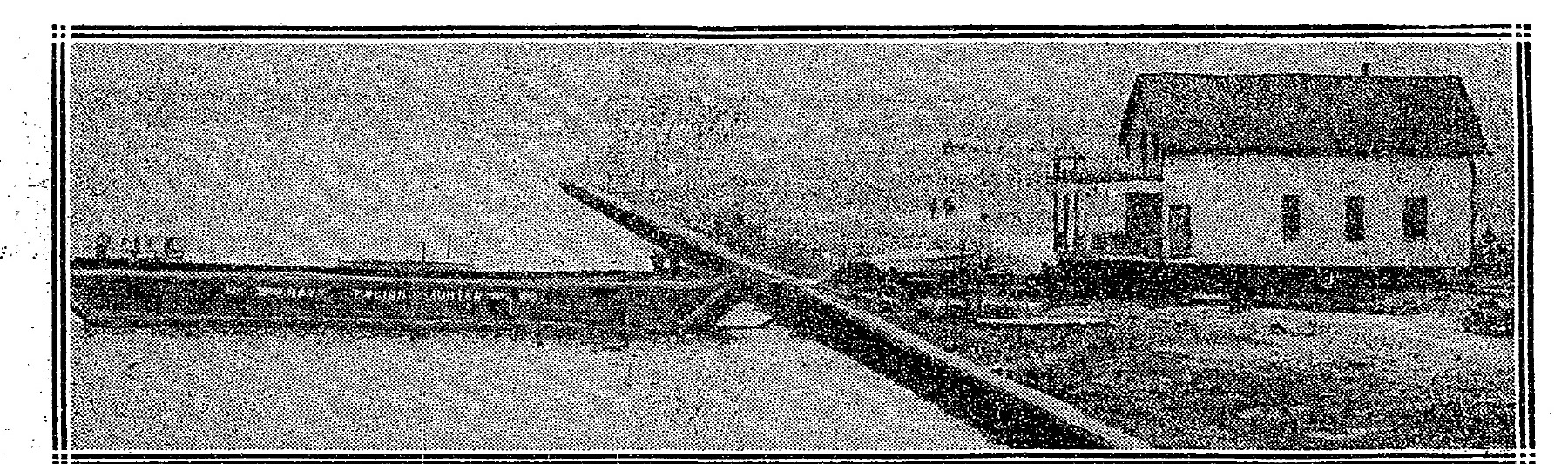The Eastern Power Boat Club clubhouse and a long scow being floated across the Anacostia River in 1924, with a cable running to the far bank.