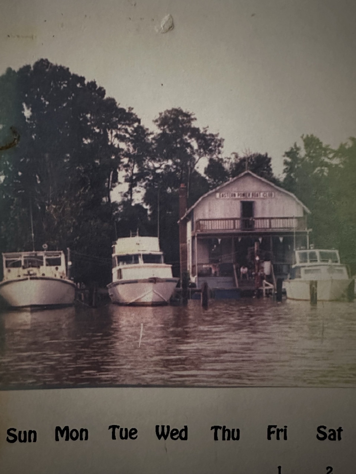 The clubhouse from the water, from the page of an old club calendar