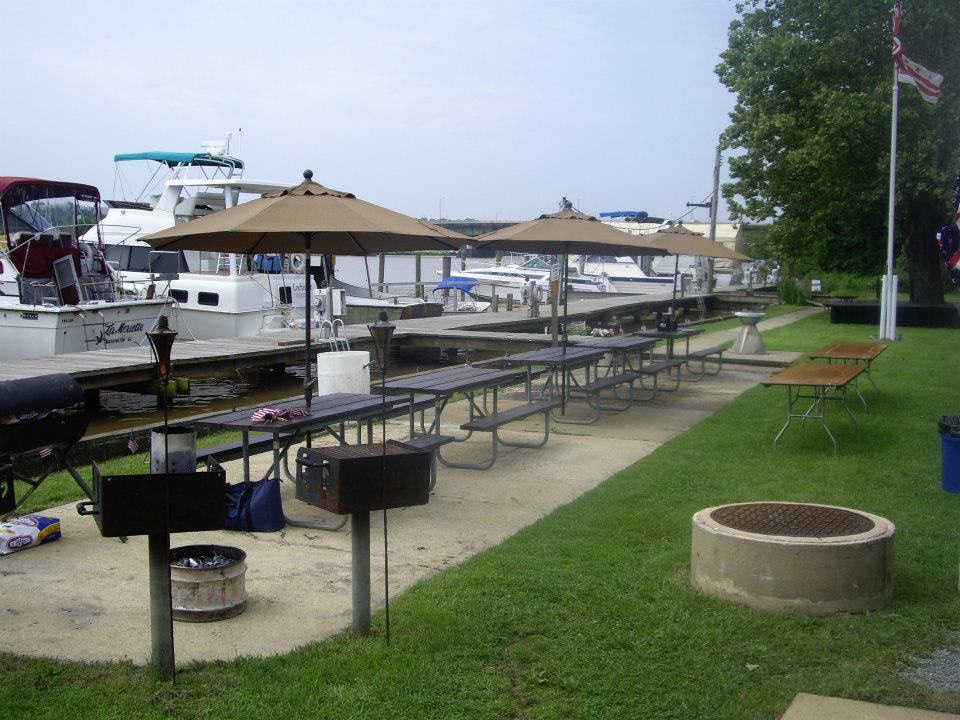Grills, umbrellas, and picnic tables along the docks