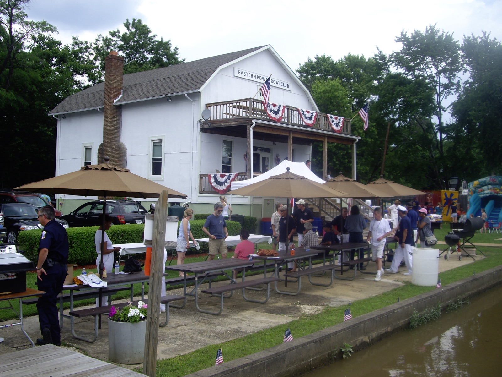 Summer cookout along the seawall, flags and bunting up